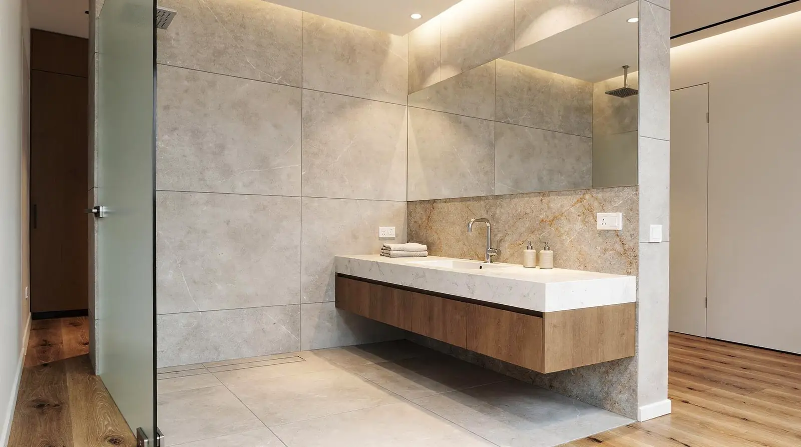 Bathroom tiles should be chosen for moisture resistance and slip resistance, with porcelain and ceramic